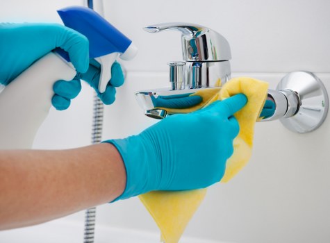 Commercial cleaner in Streatham maintaining an office workspace